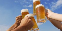Raising drinking glasses to celebrate - drinking? Image courtesy of Huffington Post