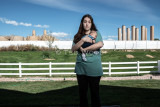 Karley Robinson with her son outside their home in Windsor. Photo credit: Ted Wood